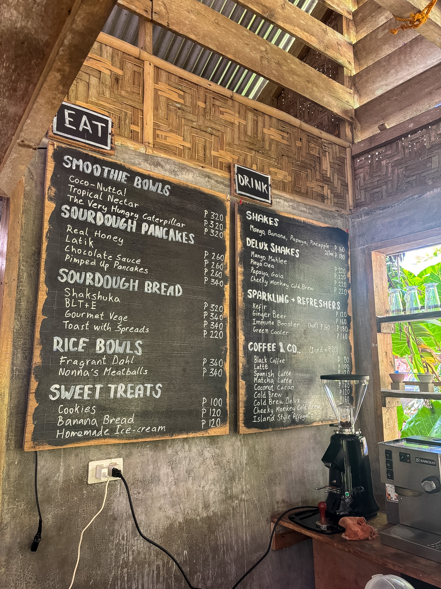Interior of Common Ground café with counter and bookshelves