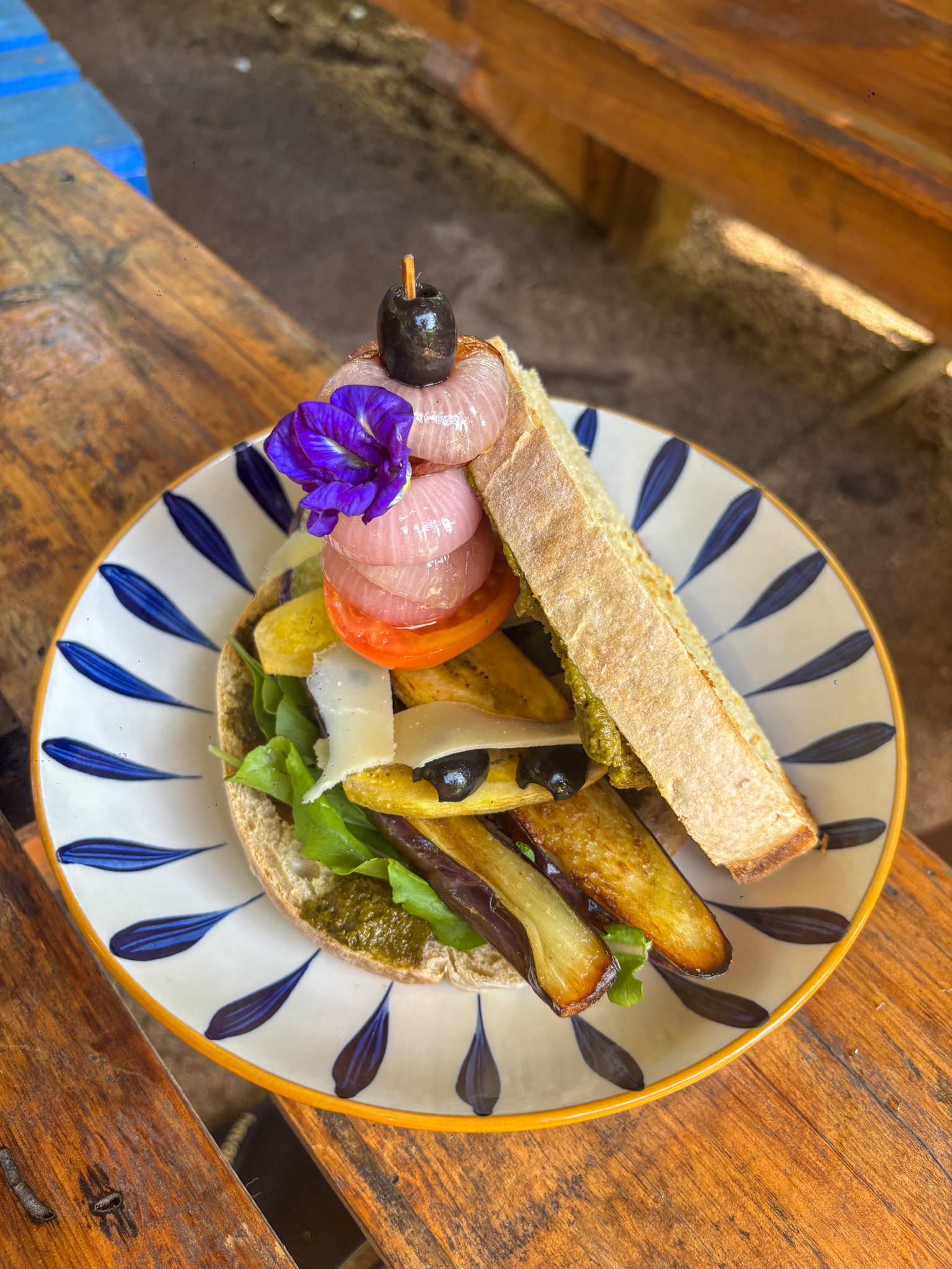 Gourmet vegetable sourdough sandwich with pesto and grilled vegetables