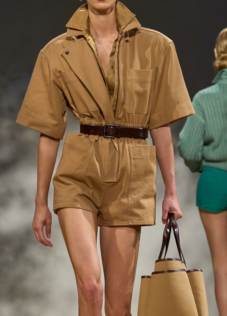 Runway safari-inspired romper with belt and collar